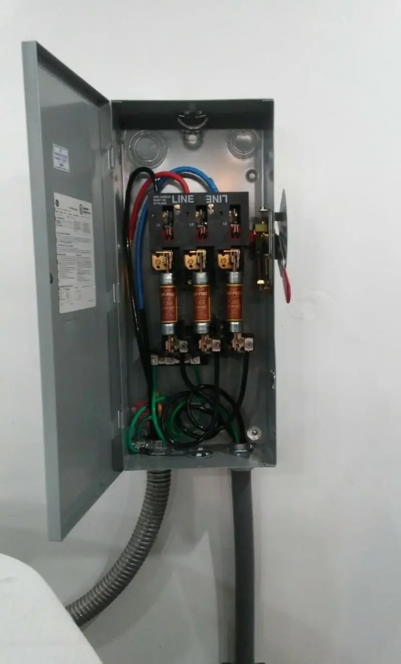 Three-phase disconnect switch installed for Smoke Detector Installation in Mills River